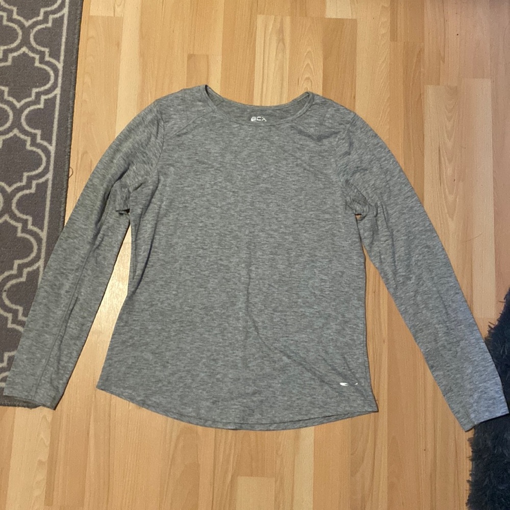 Long sleeved gray athletic top